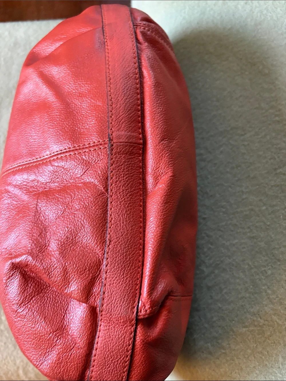 Vibrant Red Leather Shoulder Bag with Curved Zip Flap